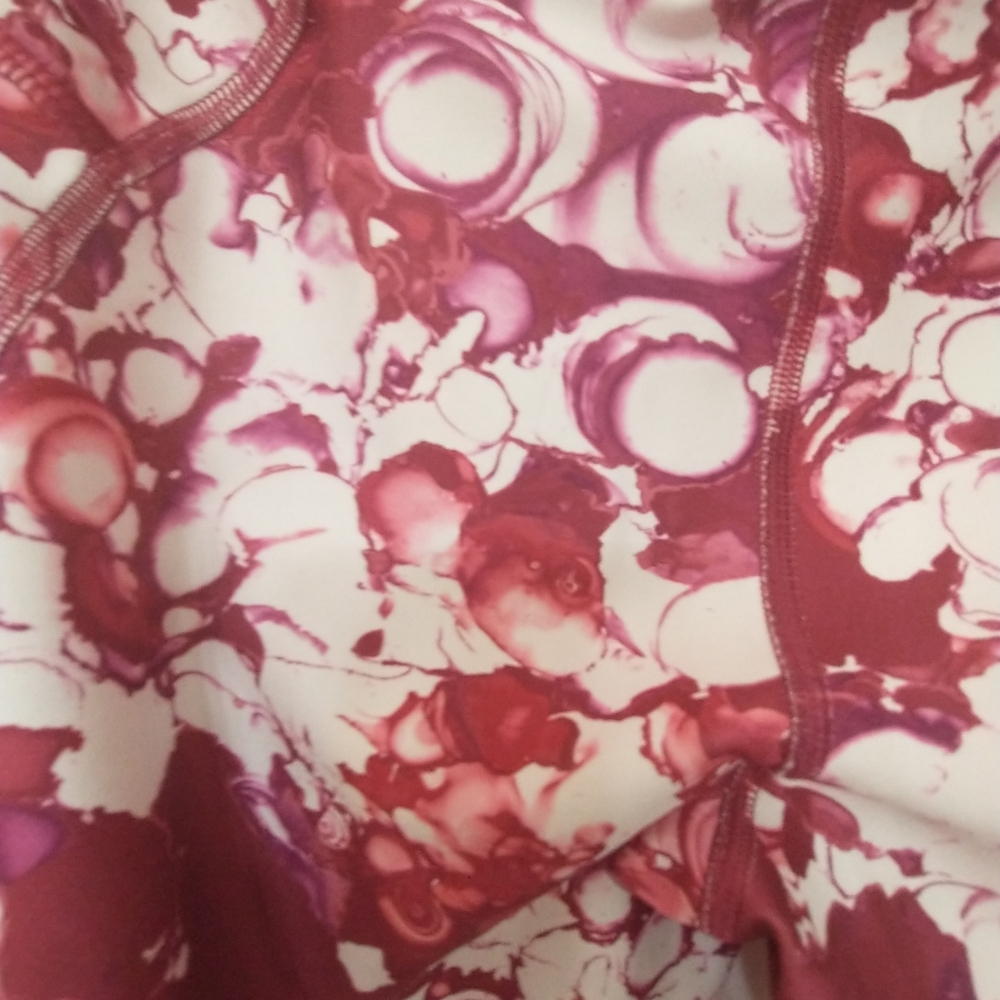 Under Armour Cranberry  and White Whimsical Patterned Leggings with Mesh Inserts - Picture 7 of 11